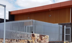 Manning Community hub curved galvanised palisade vertical fin steel fence