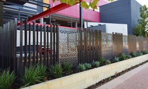 Shopping centre architectural vertical flatbar fence with perforated alum 2B